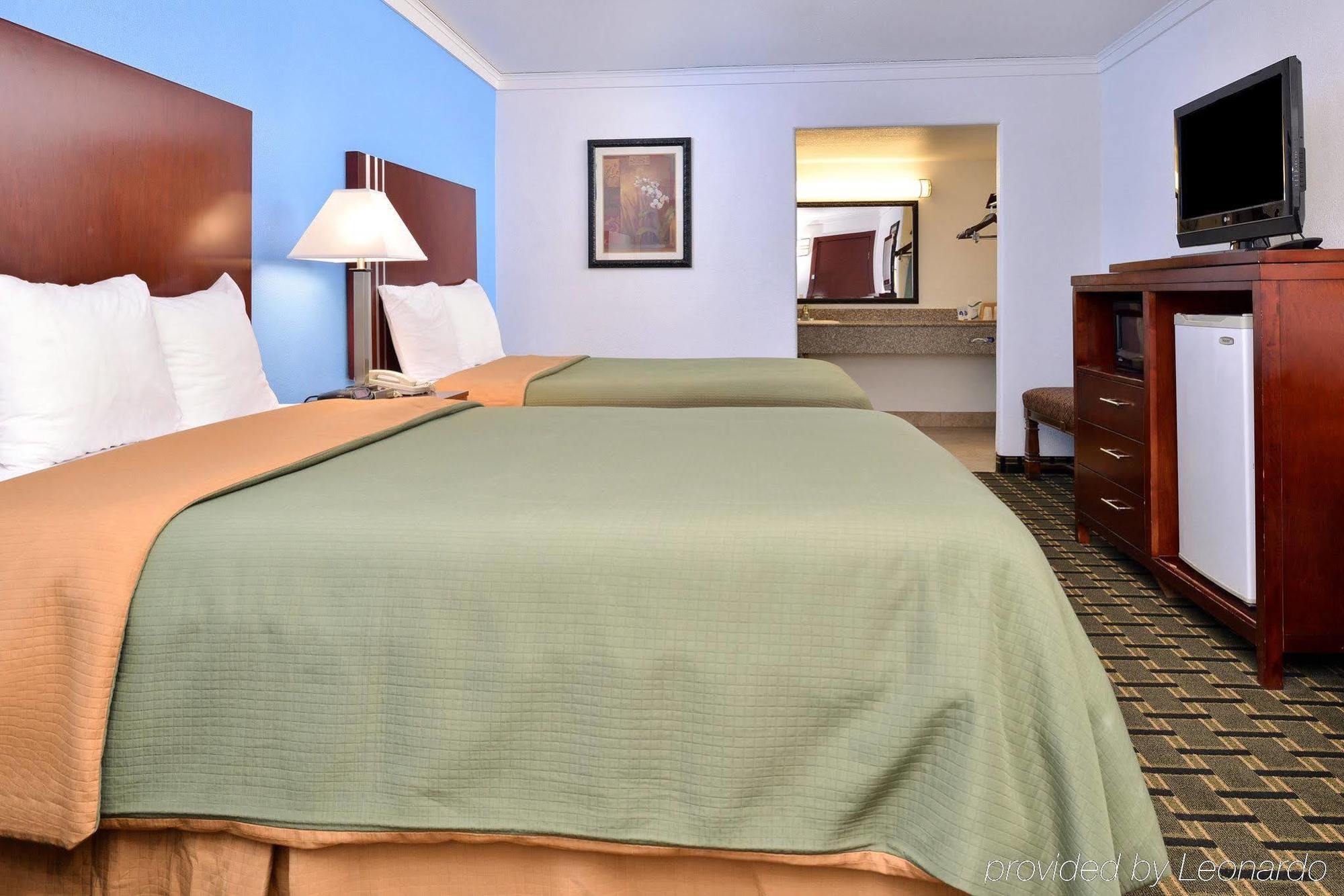 Executive Inn Edmond Bagian luar foto